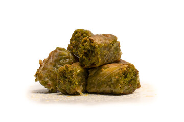 Turkish pistachio baklava isolated on white background.