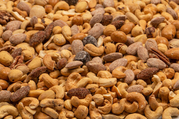 A group of almonds, pistachios, walnuts, macadamia, cashews.