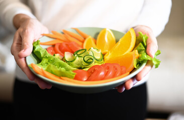 Salad preparation,Top view of fresh fruits and vegetables. Concept of health care. Balanced diet.
