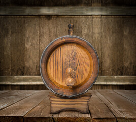 One wooden barrel on rack in cellar