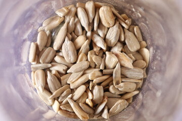 Dried Sunflower seeds filled in the plastic bottle or container with selective focus 