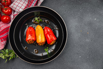 pepper stuffed meat stuffing bell pepper paprika pork, beef, chicken meat meal food snack on the table copy space food background rustic top view 