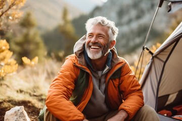 Happy middle aged man on a camping in mountains Generative AI