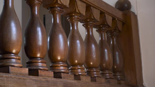 Shooting of antique carved wooden railings.