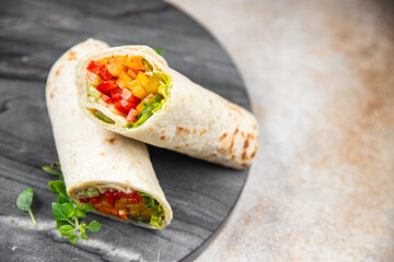 tortilla vegetable tacos vegetarian vegan food burrito fajita shawarma with vegetables pita healthy meal food snack on the table copy space food background rustic top view 