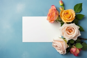 White blank paper card with roses on pastel color background.