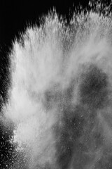 Fototapeta premium Dynamic black background with splashes of water, creating a unique and eye-catching composition