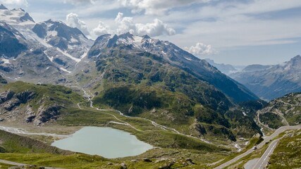 a couple of mountains that are in the air with a lake