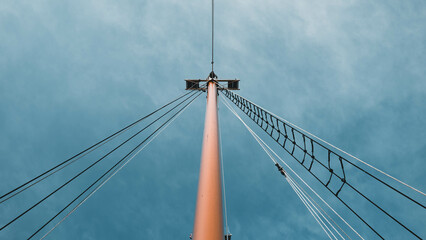 Obraz premium sailboat sailing in the ocean with cloudy sky