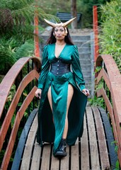 Female cosplayer dressed up as Loki - obrazy, fototapety, plakaty
