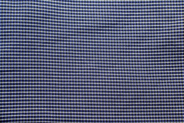 Fabric design background with small white and blue stripes, space for text
