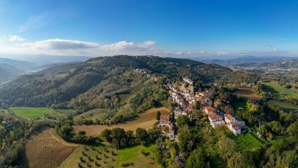 Fototapeta na wymiar Aerial shot of the village of Colbordolo in Macerata, Italy
