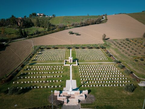 Aerial of the English war cemetery in Montecchio Italy with the blue sky in the background