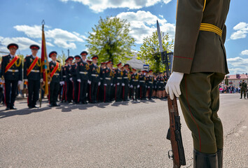 Guard of honor shoulder to shoulder during the parade.