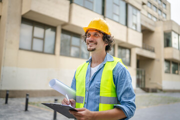 architect man construction engineer worker or inspector stand outdoors