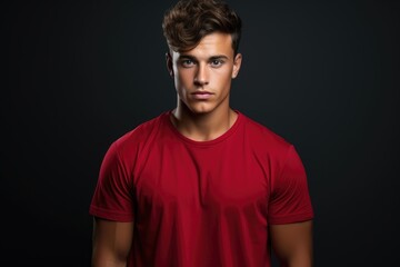 Handsome man with fit body wearing red t-shirt