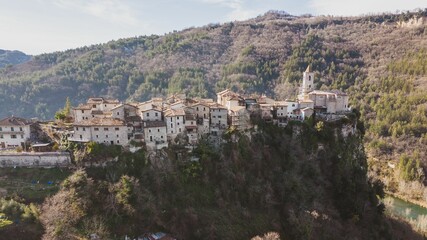Fototapeta na wymiar Aerial view of the historic Castle Trosino and nearby cliffs in Ascoli Piceno, Marche, Italy