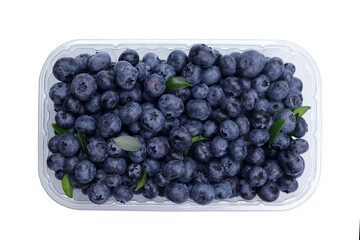 Ripe fresh sweet blueberries in a plastic container, the concept of selling in a store, preparations for the winter, harvest