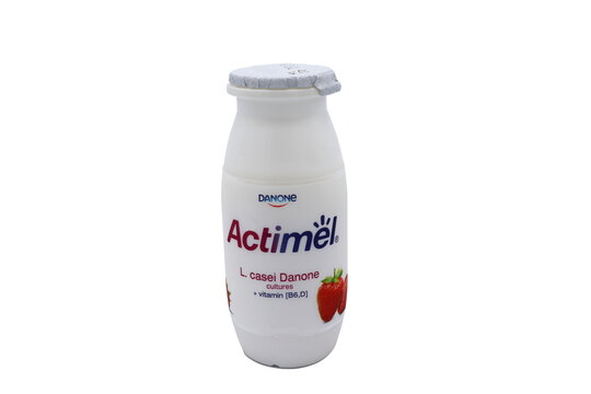 Actimel yoghurt with strawberry taste. Close up and isolated on a white background.