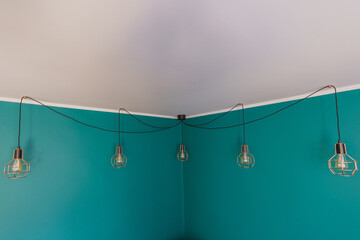 Beautiful copper hanging lamps with decorative bulbs