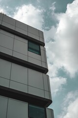 Vertical shot of a abstract modern building on a sunny day under the blue sky in Korea