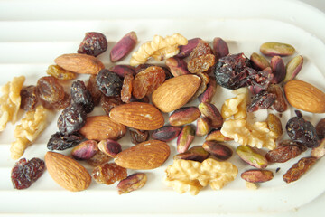 close up of many mixed nuts 