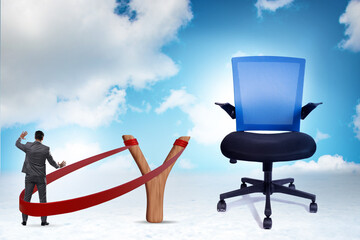 Career concept with businessman launched from slingshot