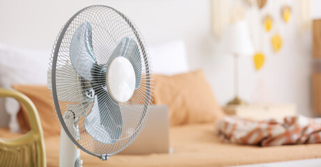 Modern electric fan in bedroom