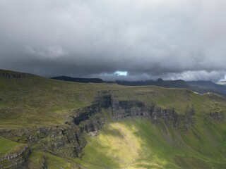 Aerial view of a rocky mountain landscape with the Old Man of Storr, on the Isle of Skye in Scotland