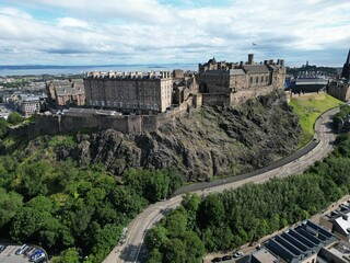 Fototapeta premium Aerial view of Edinburgh Castle in Edinburgh, Scotland with trees and buildings in the foreground