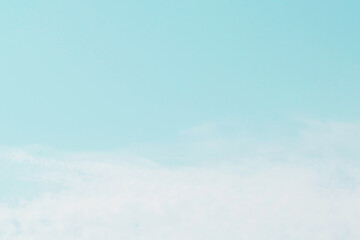 Blue pastel colour sky with white clouds background.