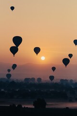 View of Teotihuacan ruins in Mexico City, with an array of colorful hot air balloons in the sky