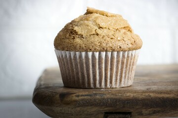 the front of a muffin on a wooden countertop