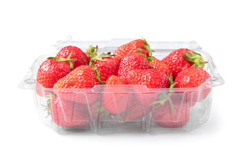 Plastic container with fresh strawberry on white background