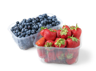 Plastic containers with fresh blueberry and strawberry on white background