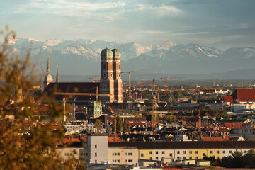 Famous Munich Skyline with Frauenkirche and Alps