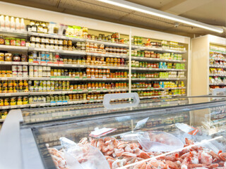 choosing a dairy products at supermarket.various goods on the supermarket shelves