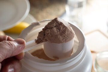 A view of a scoop of protein powder.