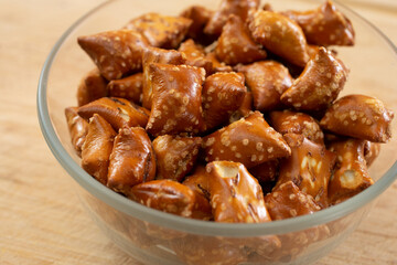 A view of a bowl of pretzel bites.