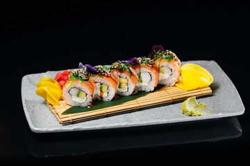 Sushi Chuka Roll with salmon, tiger prawn, cream cheese, avocado, hiyashi-wakame seaweed, walnut-sesame sauce, unagi sauce, sesame
