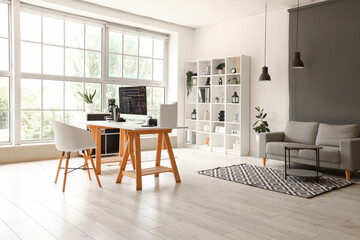 Interior of modern office with programmer's workplace