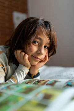 kid reading comic book