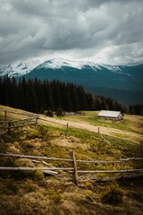 Wooden fence in the foreground of the picturesque Carpathian Mountains in Ukraine