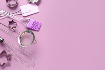 Obraz na płótnie Canvas Baking utensils on pink background