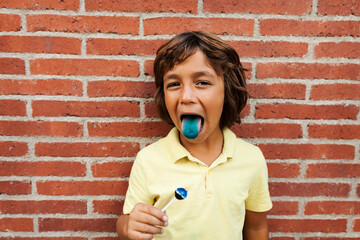 silly boy with blue tongue