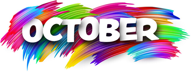 October paper word sign with colorful spectrum paint brush strokes over white. Vector illustration.