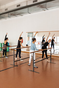 women Doing A Dance Routine With A Ballet Teacher 