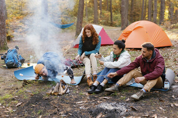 Campfire camping fire food picnic firewood cookout together 