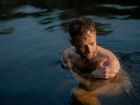 Man bathing in river 