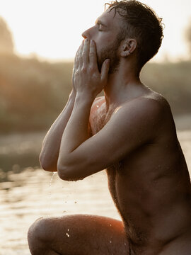 Man bathing in river 
